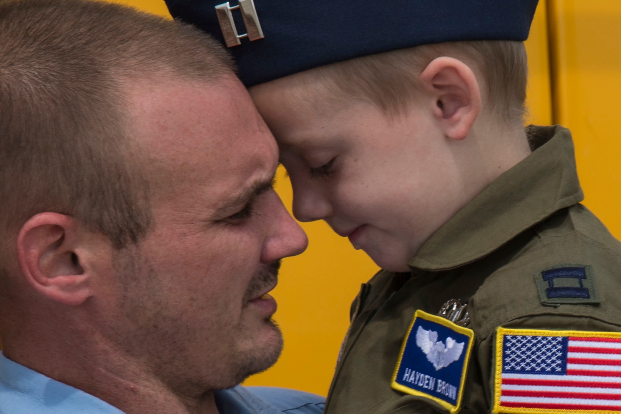 Jonathan Brown and his 6-year-old son, Hayden Brown, share a moment, Aug. 17, 2016, Scott Air Force Base, Ill. Scott AFB teamed up with Alton VFW 1308 and hosted Hayden as an honorary pilot for the day. Hayden Brown has a rare degenerative disease called Metachromatic Leukodystrophy, commonly referred to as MLD, and throughout this illness, he has shown tremendous courage and determination. (U.S. Air Force Airman 1st Class Melissa Estevez)