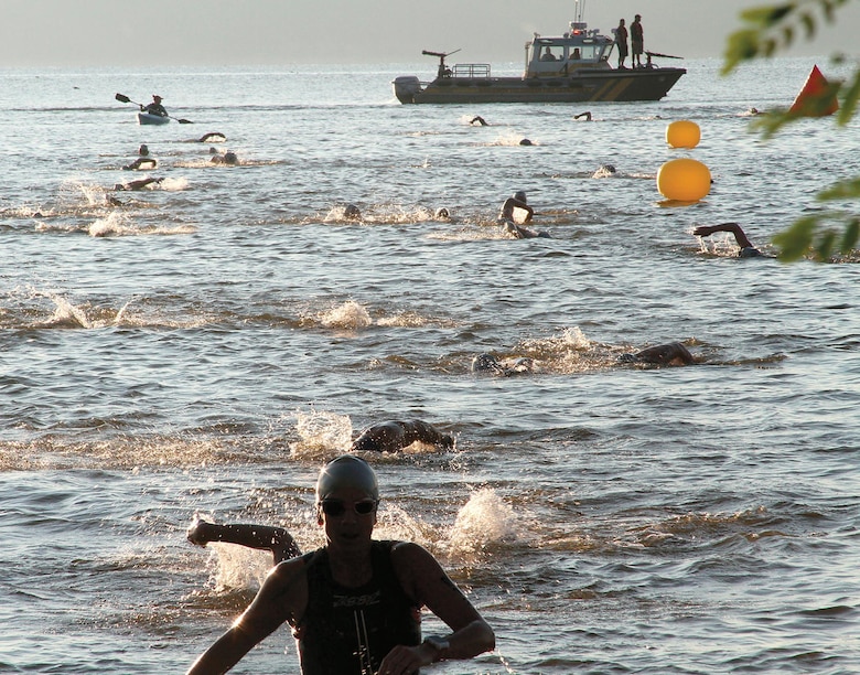 Athletes complete the first leg of the Quantico Tri, the 750M swim.