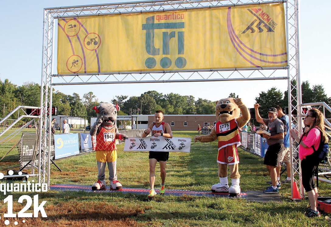All-Marine Runner Maj. Richard Jennings of Quantico is the first to cross the 12K finish line with a time or 44:27.