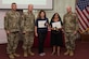 Volunteer of the quarter winners, left, Ismariela Marrero-Colon and Dora Jones receive their awards from Fort Eustis leadership at Fort Eustis, Va., Aug. 23, 2016. Volunteer of the quarter awards individuals who go beyond the standards to help improve the installation. (U.S. Air Force photo by Airman 1st Class Derek Seifert) 
