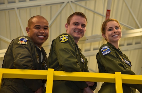 1st Lt. Mark Galera aeromedical evacuation flight nurse, Staff Sgt. Ryan Schiemo and Tech. Sgt. Marie Carrol, aeromedical evacuation technicians pose for a photo August 21, 2016, at Minneapolis Air Reserve Station, Minnesota. The three Citizen Airmen responded to a motorcycle accident August 10, utilizing the skills they've acquired through their Air Force Reserve and civilian careers, secured the scene and stabilized the victim of the crash until paramedics arrived to transport the him to the hospital. (U.S. Air Force photo by Staff Sgt. Adam C. Borgman)