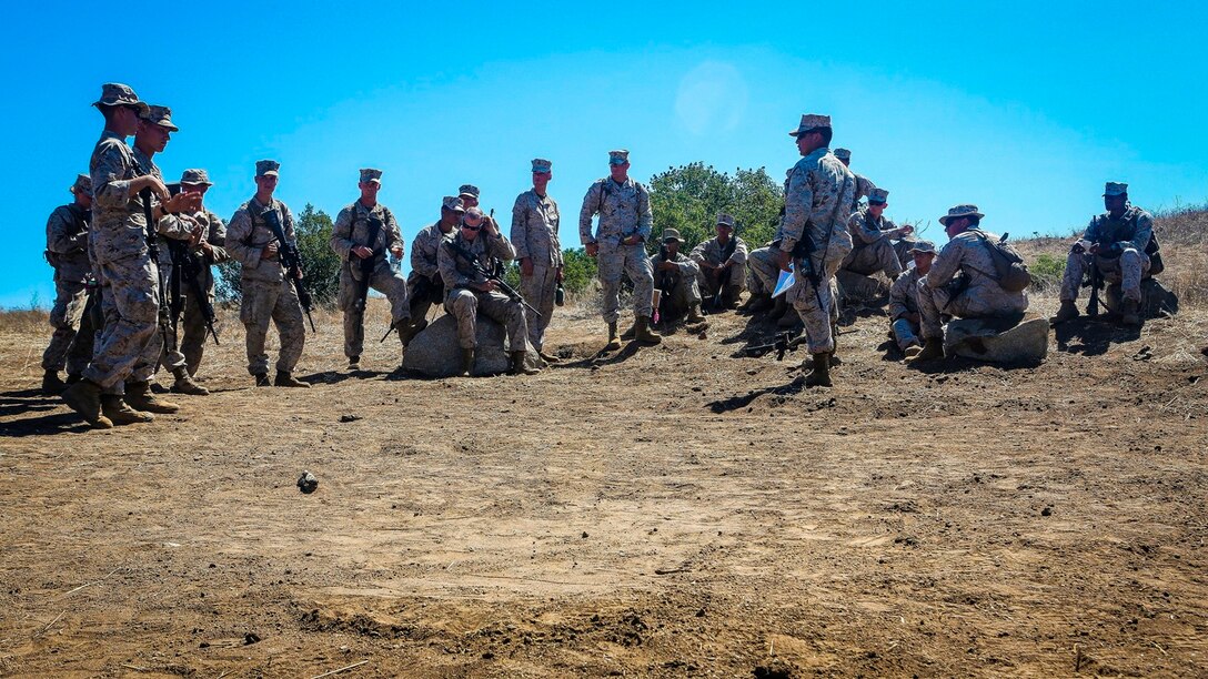 U.S. Marines with the 1st Marine Logistics Group, Combat Skills Training School stand by for a brief as part of the Tactical Convoy Course at Camp Pendleton, Calif.,  Aug. 19, 2016. The purpose of the Tactical Convoy Course training is to teach procedures to counter threats and mitigate risks to Marine forces conducting tactical convoys. (U.S. Marines photo by LCpl. Salmineo Sherman Jr./released)