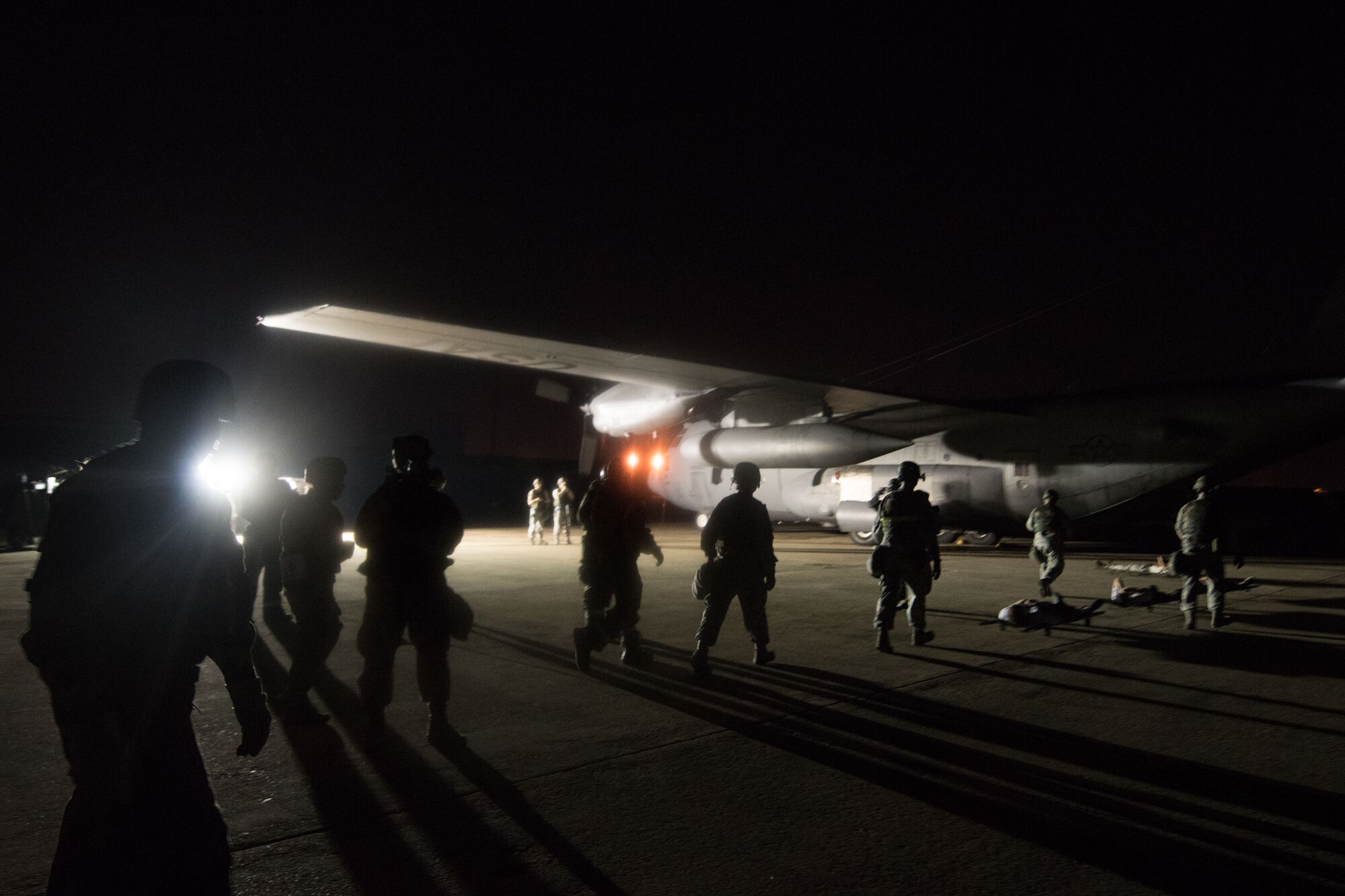 U.S. Airmen from the 51st Aerospace Medicine Squadron participate in an aeromedical evacuation scenario during Exercise Beverly Herd 16-2 at Osan Air Base, Republic of Korea, Aug. 25, 2016.  Beverly Herd is a wing-level exercise designed to maintain the readiness posture of the members of Osan, and the 51st AMDS continually train during the exercise to ensure “Fight Tonight” readiness. (U.S. Air Force photo by Senior Airman Dillian Bamman)