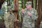 WASHINGTON (Aug. 23, 2016) - Gen. Mark A. Milley, U.S. Army Chief of Staff, at Lightning Academy observes a Soldier demonstrate a technique to start a fire, called a "fire taco," during his Asia-Pacific tour, Aug. 23, 2016. 