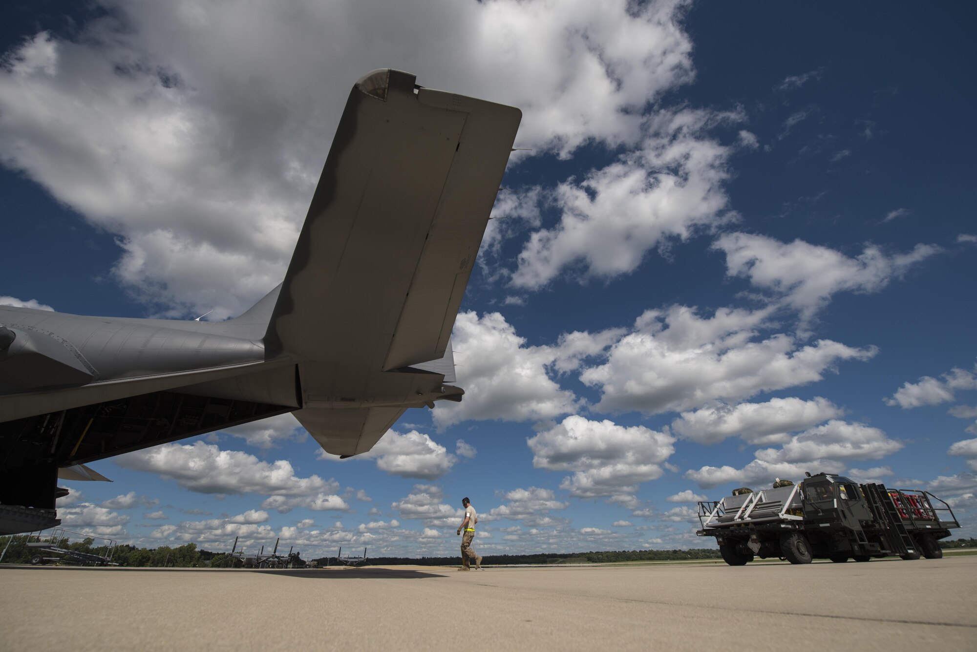 Air Commandos with the 1st Special Operations Wing prepare to load a MC-130H Combat Talon II aircraft for a mass container delivery system exercise during Task Force Exercise Olympus Archer at Wright Patterson Air Force Base, Ohio, Aug. 21, 2016. Olympus Archers focus is to maximize training opportunities for more than 230 Air Commandos with the 1st Special Operations Wing with an emphasis on medical operations in conjunction with flying operations. (U.S. Air Force photo by Staff Sgt. Christopher Callaway)