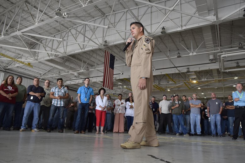Maj. Nathan Barnhart, 343rd Bomb Squadron, B-52H radar navigator/weapon system officer, foreground, speaks to  members of the 565th Aircraft Maintenance Squadron and Team Tinker, about his recent deployment in support of Operation Inherent Resolve and how the B-52H aircraft performed in combat Aug. 17, 2016, Tinker Air Force Base, Okla. The 343rd BS is part of the 307th Bomb Wing, Air Force Reserve Command, Barksdale AFB, La., which supplies combat qualified crews to augment their active-duty counterparts in the 2nd Bomb Wing, also at Barksdale. (U.S. Air Force photo/Greg L. Davis)