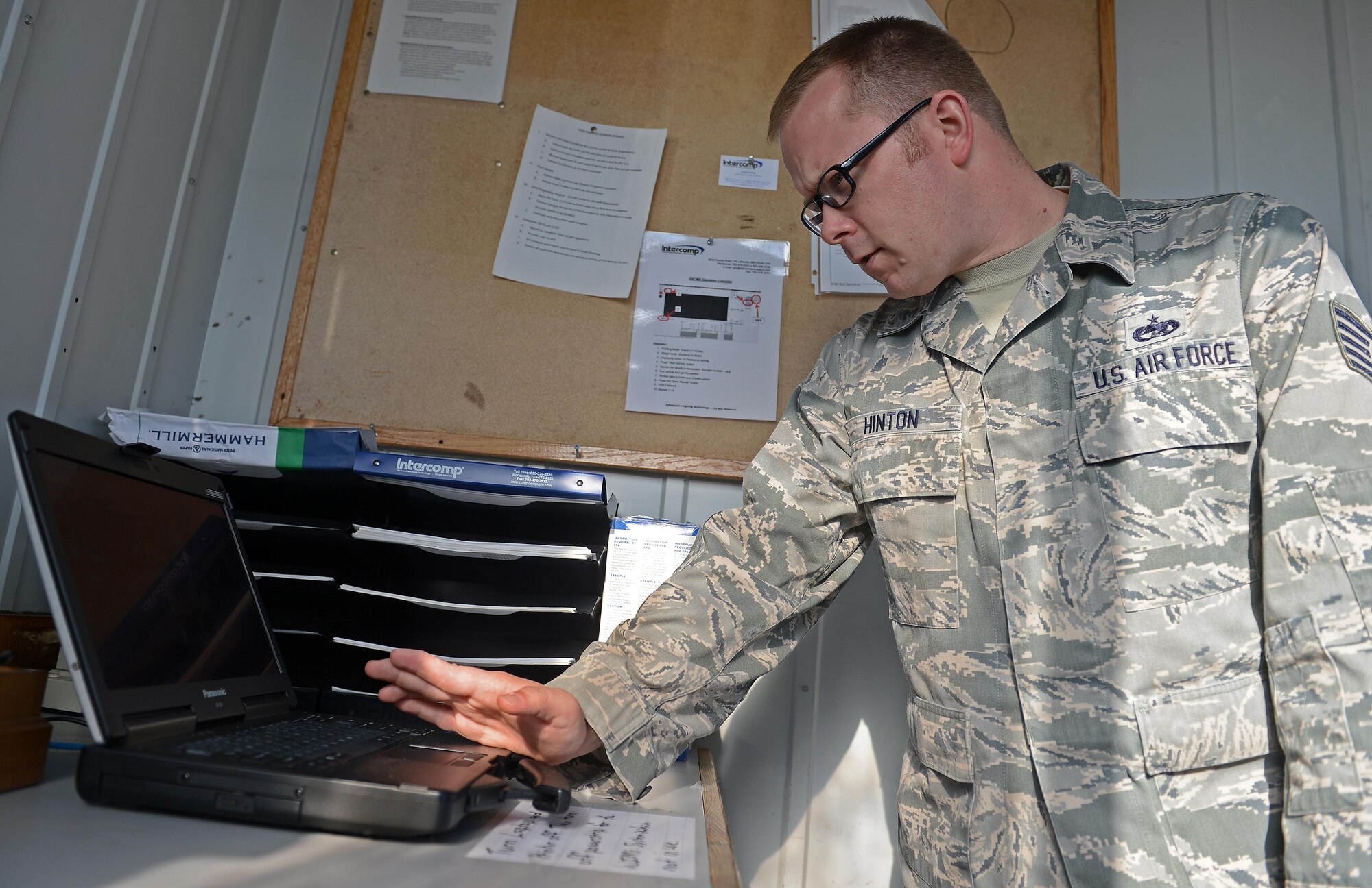 Tech. Sgt. Eric Hinton, 62nd Aerial Port Squadron air transportation technician, reads that data from the weigh-in-motion system Aug. 23, 2016 at Joint Base Lewis-McChord, Wash. The 62nd APS received the weigh-in-motion system to help expedite the time it takes to collect important data from a vehicle. (U.S. Air Force photo/Senior Airman Divine Cox)