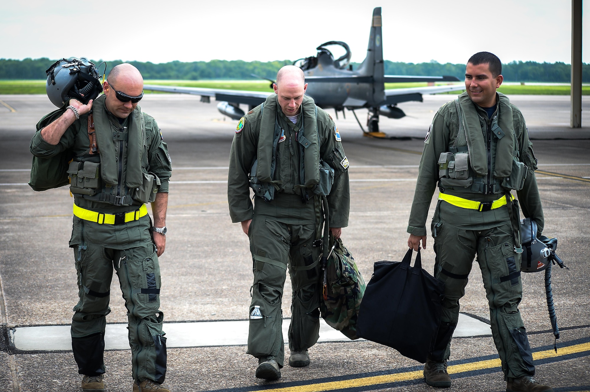 Colombian and U.S. Air Force pilots walk away from an A-29B Super Tucano after a flight during Exercise Green Flag East at Barksdale Air Force Base, La., Aug. 22, 2016. Colombia and U.S. share a special relationship, and the joint training exercise provides a platform to strengthen those ties. (U.S. Air Force photo / Senior Airman Mozer O. Da Cunha)