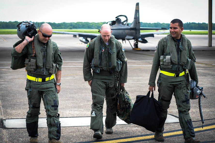 Colombian and U.S. Air Force pilots walk away from an A-29B Super Tucano after a flight during Exercise Green Flag East at Barksdale Air Force Base, La., Aug. 22, 2016. Colombia and U.S. share a special relationship, and the joint training exercise provides a platform to strengthen those ties. (U.S. Air Force photo / Senior Airman Mozer O. Da Cunha)