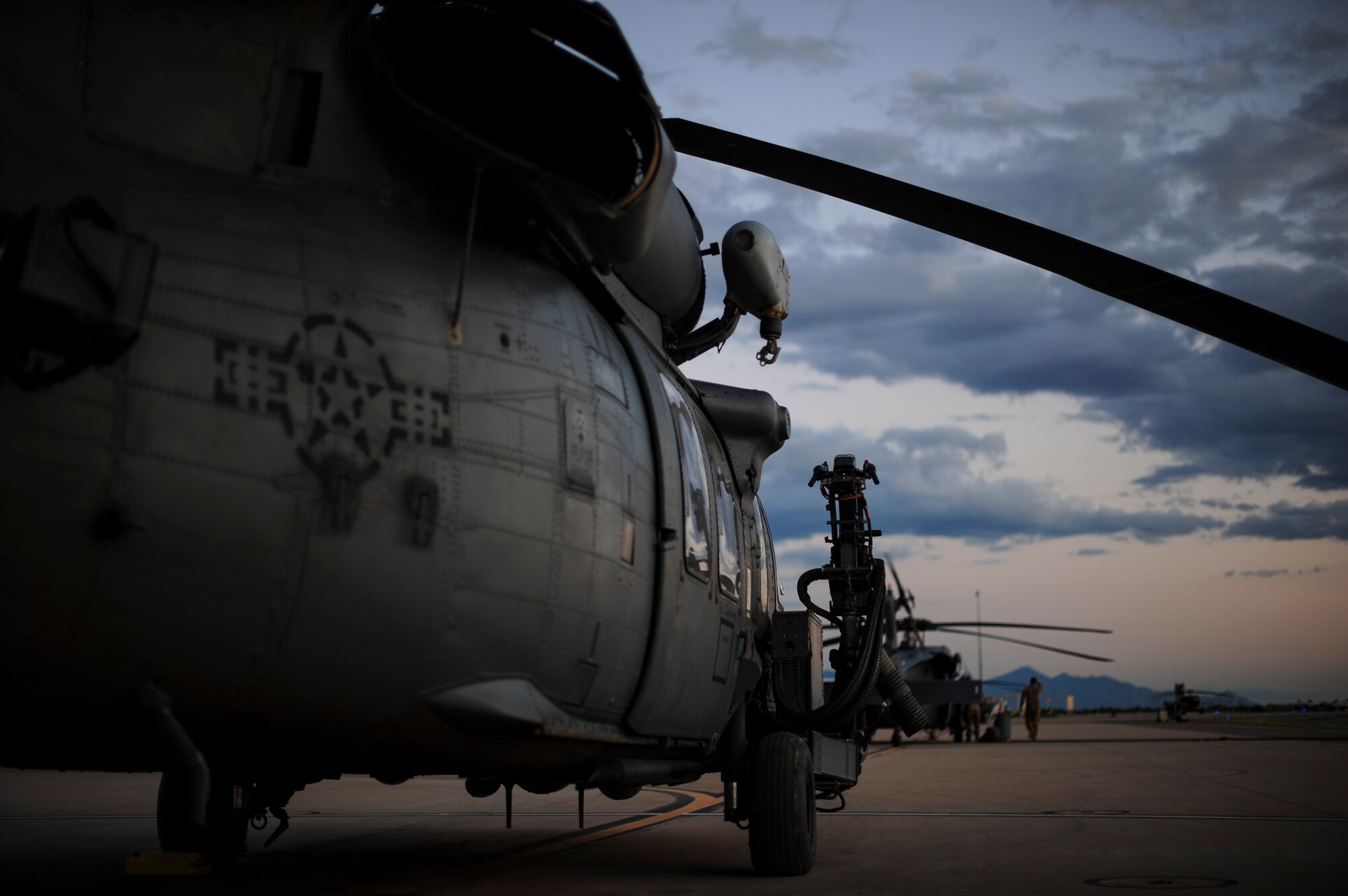 An HH-60G Pave Hawk sits on the flight line at Davis-Monthan Air Force Base, Ariz., Aug. 23, 2016. The primary mission of the HH-60 is to conduct around the clock personnel recovery operations in hostile environments. (U.S. Air Force photo by Airman Nathan H. Barbour)
