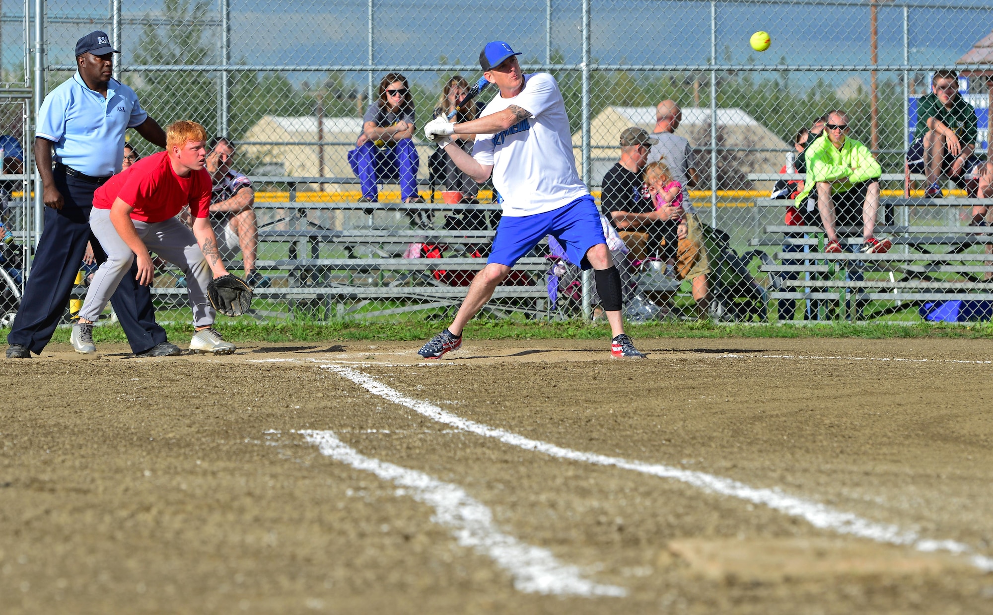 Phillip Kersey swings at the baseball field behind Buckner Physical Fitness Center, at Joint Base Elmendorf-Richardson, Alaska, Aug. 18, 2016. The Arctic Medics with the 673d Medical Group beat the 703d Aircraft Maintenance Squadron team for the championship. (U.S. Air Force photo by Airman 1st Class Javier Alvarez)