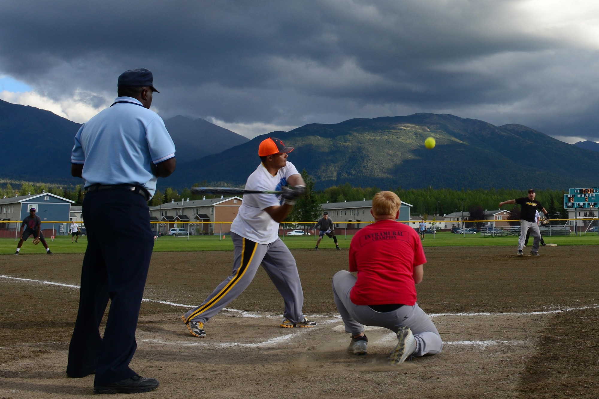 Rodrigo Contreras swings his bat at the baseball field behind Buckner Physical Fitness Center, at Joint Base Elmendorf-Richardson, Alaska, Aug. 18, 2016. Thirty-eight teams participated in the intramural softball 2016 season. Each team played 18 games in the regular season. Eight teams with the best record made it to the playoffs. (U.S. Air Force photo by Airman 1st Class Javier Alvarez)