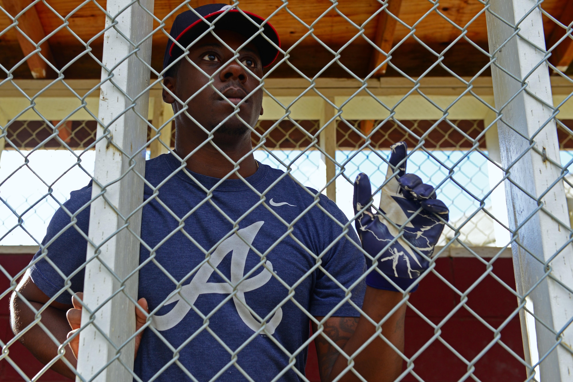 Earl Shelton looks on as his teammate approaches the batter’s box at the baseball field behind Buckner Physical Fitness Center, at Joint Base Elmendorf-Richardson, Alaska, Aug. 18, 2016. The Arctic Medics with the 673d Medical Group were undefeated in the 2016 season. (U.S. Air Force photo by Airman 1st Class Javier Alvarez)