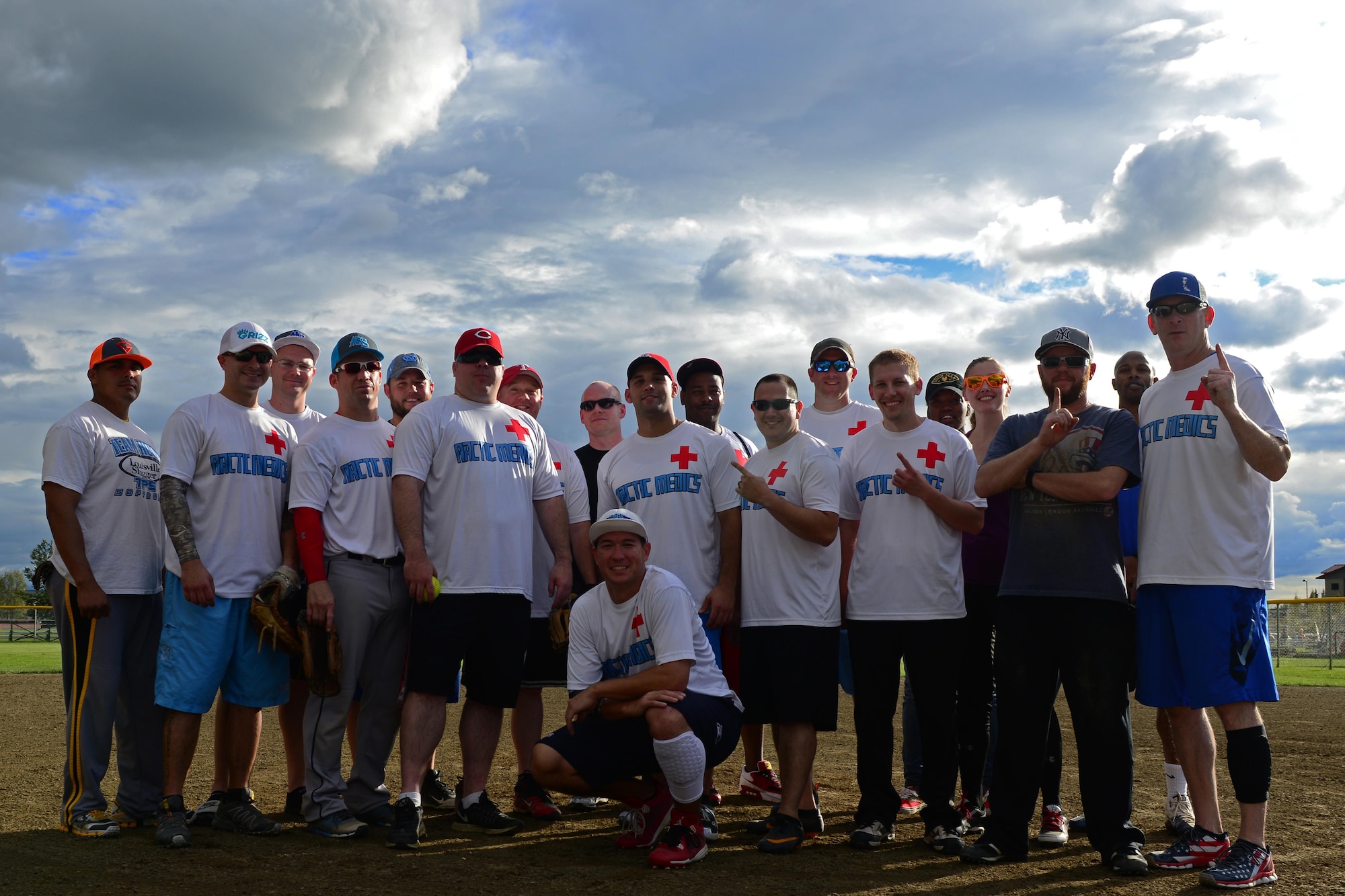 The Arctic Medics stand on the pitcher’s mound at Joint Base Elmendorf-Richardson, Alaska, Aug. 18, 2016. The Arctic Medics with the 673d Medical Group were undefeated in the 2016 season. (U.S. Air Force photo by Airman 1st Class Javier Alvarez)