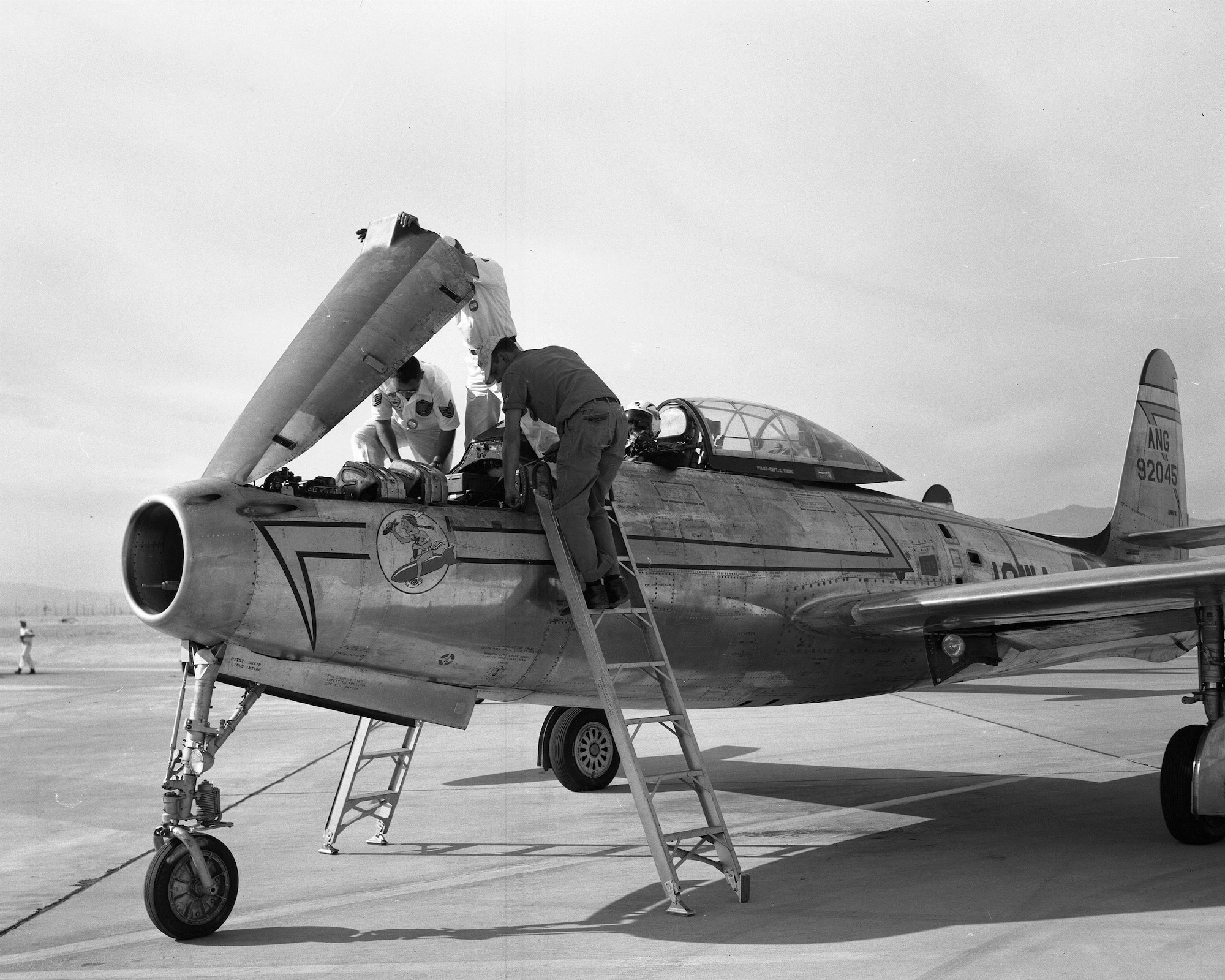 Ground crew load munitions on a U.S. Air Force F-84E Thunderjet assigned to the Iowa Air National guard while at the Air National Guard gunnery completion in 1956. As a component of the 132nd Fighter Interceptor Wing the 174th Fighter Interceptor Squadron in Sioux City flew the F-84 until 1958. During that time the 174th was awarded the Spaatz Trophy as the most outstanding Air National Guard squadron in the nation.
185th ARW Photo/ Released