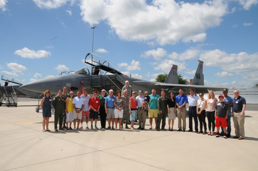 Key state and federal legislative members and their representatives gather in front of an F-15 Eagle aircraft at the conclusion of Legislative Day, Aug. 14, 2016, at the 104th Fighter Wing, Barnes Air National Guard Base, Westfield, Mass. (U.S. Air National Guard Photo by Tech. Sgt. Lindsey Sarah Watson-Kirwin)