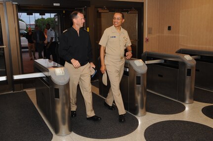 U.S. Navy Adm. Cecil D. Haney (right), U.S. Strategic Command (USSTRATCOM) commander, and the Chief of Naval Operations (CNO), U.S. Navy Adm. John M. Richardson, enter USSTRATCOM Headquarters during Richardson's visit to Offutt Air Force Base, Neb., Aug. 24, 2016. During his visit, Richardson participated in discussions with Haney and other USSTRATCOM leaders on modernization of the sea-based leg of the nuclear triad and other areas of collaboration and mutual interest. Richardson also hosted a Navy all-hands call, during which he discussed the U.S. Navy's design for maintaining maritime security today and into the future. A member of the Joint Chiefs of Staff, the CNO is the principal naval adviser to the president and to the SECNAV on the conduct of war, and is the principal adviser and naval executive to the SECNAV on the conduct of activities of the Department of the Navy. One of nine DoD unified combatant commands, USSTRATCOM has global strategic missions assigned through the Unified Command Plan, which include strategic deterrence; space operations; cyberspace operations; joint electronic warfare; global strike; missile defense; intelligence, surveillance and reconnaissance; combating weapons of mass destruction; and analysis and targeting. (USSTRATCOM photo by Steve Cunningham)