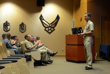 The Chief of Naval Operations (CNO), U.S. Navy Adm. John M. Richardson (right), provides remarks during a Navy all-hands call at Offutt Air Force Base, Neb., Aug. 24, 2016. During the forum, Richardson discussed the U.S. Navy's design for maintaining maritime security today and into the future and answered questions from members of the audience. While here, Richardson also participated in discussions with U.S. Navy Adm. Cecil D. Haney (seated in front row), U.S. Strategic Command (USSTRATCOM) commander, and other USSTRATCOM leaders on modernization of the sea-based leg of the nuclear triad and other areas of collaboration and mutual interest. A member of the Joint Chiefs of Staff, the CNO is the principal naval adviser to the president and to the Secretary of the Navy (SECNAV) on the conduct of war, and is the principal adviser and naval executive to the SECNAV on the conduct of activities of the Department of the Navy. One of nine DoD unified combatant commands, USSTRATCOM has global strategic missions assigned through the Unified Command Plan, which include strategic deterrence; space operations; cyberspace operations; joint electronic warfare; global strike; missile defense; intelligence, surveillance and reconnaissance; combating weapons of mass destruction; and analysis and targeting. (U.S. Air Force photo by Staff Sgt. Jonathan Lovelady)