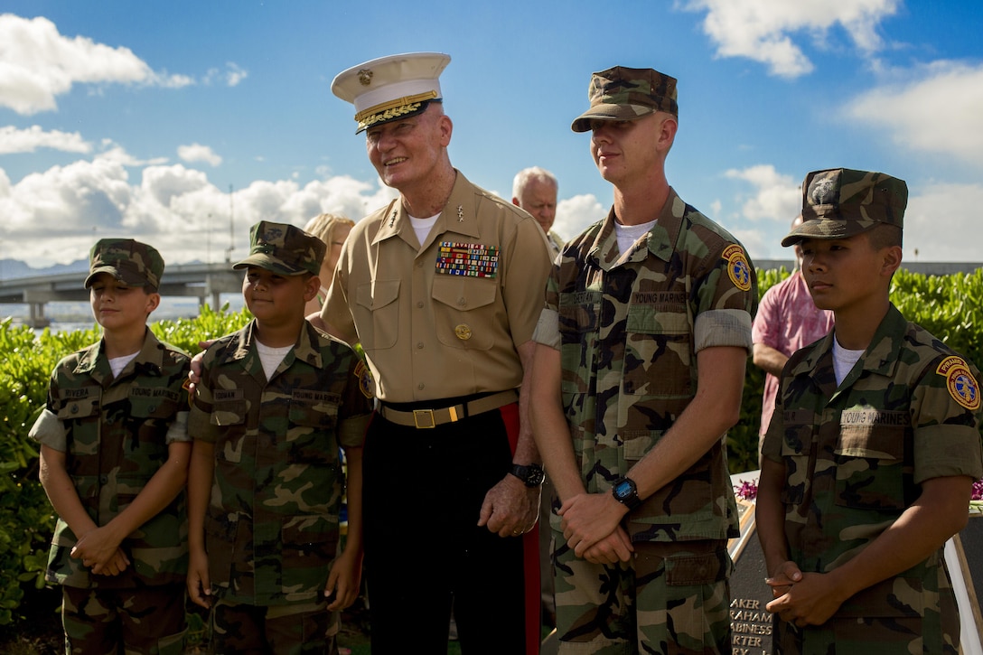 U.S. Marine Lt. Gen. John A Toolan, commander of U.S. Marine Corps Forces, Pacific, stands with members of the Pyramid Rock Young Marines program during the Marine Memorial Rededication Ceremony at the USS ARIZONA Education Center, Honolulu, Hawaii, Aug. 19, 2016. 