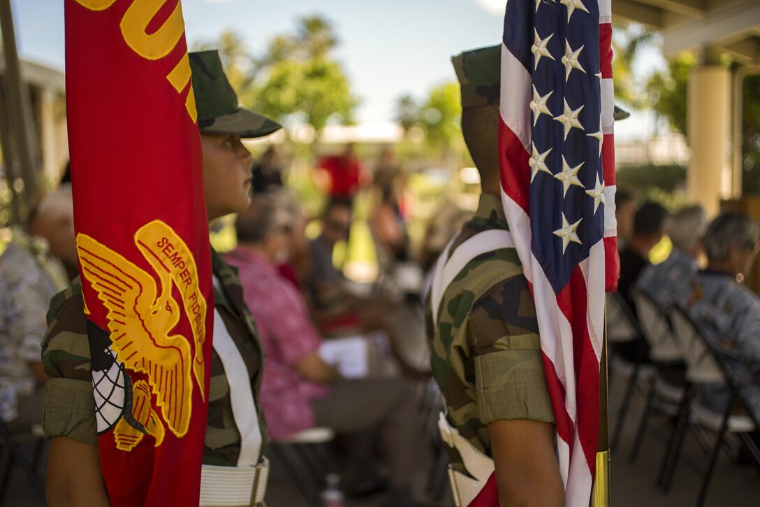 Members of Pyramid Rock Young Marines program prepare to post colors during the Marine Memorial Rededication Ceremony at the USS ARIZONA Education Center, Honolulu, Hawaii, Aug. 19, 2016. The memorial is dedicated to the 73 U.S. Marines that made the ultimate sacrifice and their 15 fellow Marines who survived the attack on Pearl Harbor.