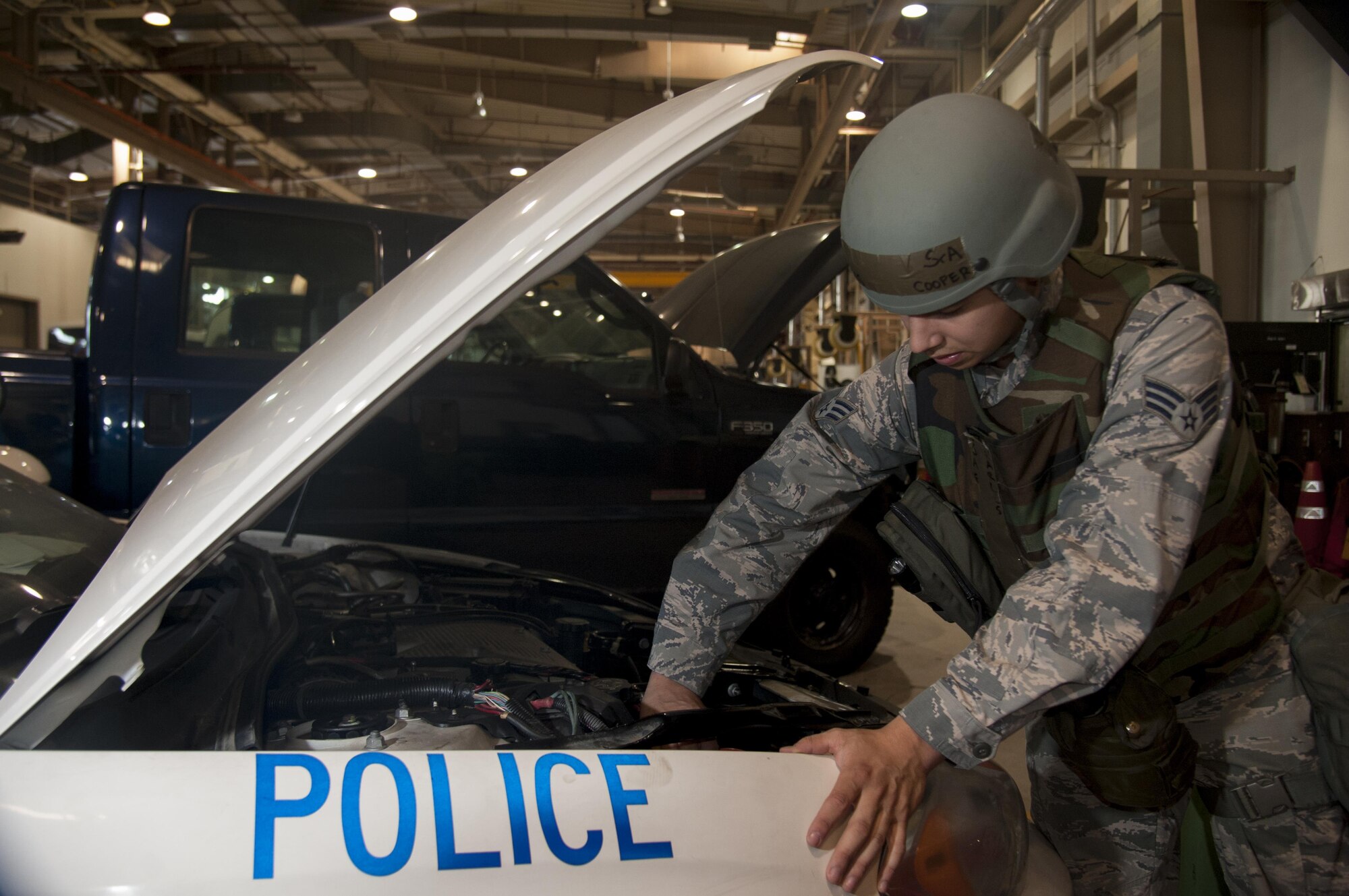 Senior Airman Charles Cooper, 51st Logistics Squadron vehicle maintenance journeyman, connects a freshly-charged battery during Exercise Beverly Herd 16-2 on Osan Air Base, Republic of Korea, Aug. 25, 2016. Cooper and other vehicle maintainers keep Osan’s fleet of vehicles running during the exercise enabling operations and defense of the base. (U.S. Air Force photo by Staff Sgt. Jonathan Steffen)
