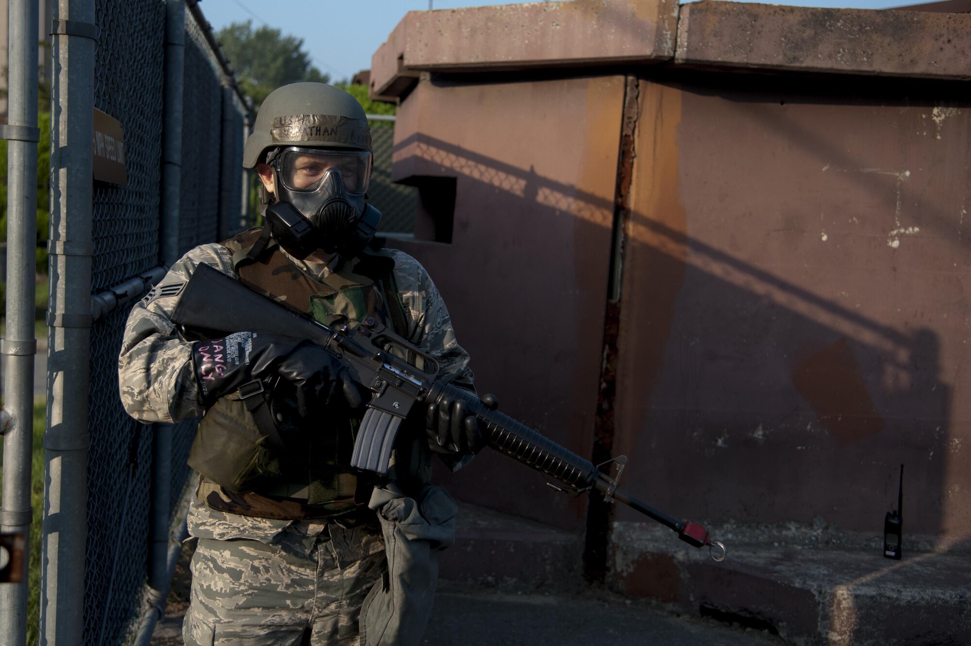 Senior Airman Jonathan Ryan, 51st Logistics Readiness Squadron vehicle maintenance journeyman, guards an entry control point at the vehicle maintenance compound on Osan Air Base, Republic of Korea, Aug. 25, 2016. Ryan and other 51st LRS Airmen provided security to their compound during Exercise Beverly Herd 16-2. (U.S. Air Force photo by Staff Sgt. Jonathan Steffen)