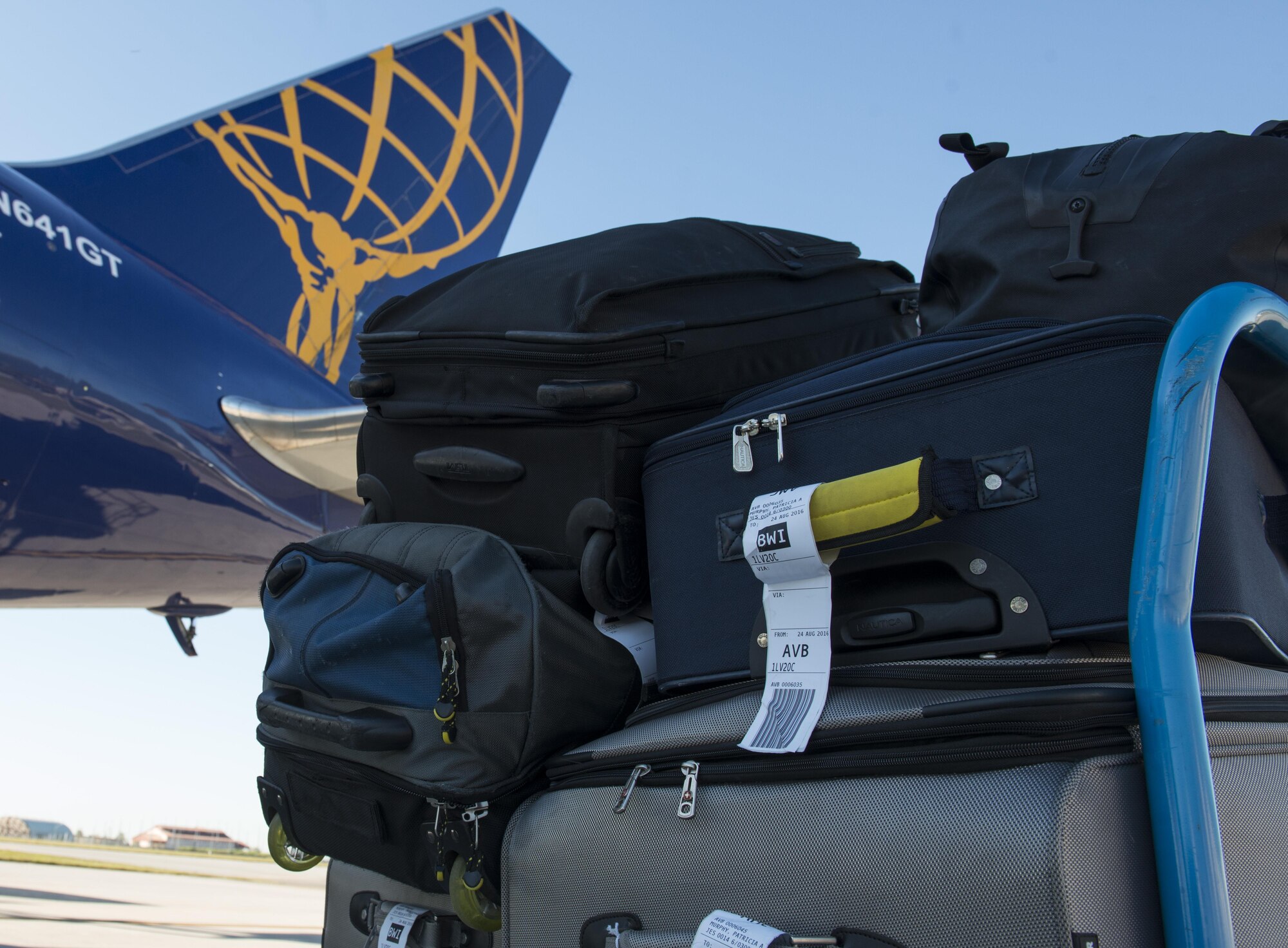 Luggage sits on the flight line prior to being loaded on the Patriot Express Aug. 24, 2016, at Aviano Air Base, Italy. The 724th Air Mobility Squadron has facilitated the transportation of 15,841 individuals and 292 tons of cargo so far this year. (U.S. Air Force photo by Senior Airman Krystal Ardrey/Released)