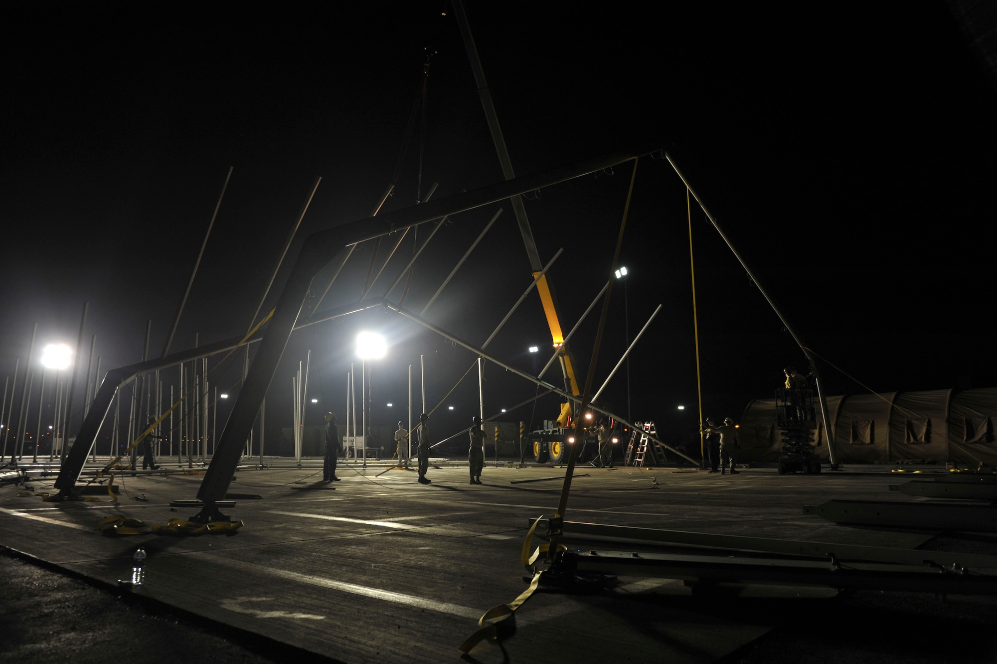 U.S. Air Force Airmen with the 49th Materiel Maintenance Squadron (MMS), from Holloman Air Force Base, N.M., assemble the frame of an 8K dome shelter Aug. 7, 2016 at Incirlik Air Base, Turkey. The 49th MMS is the only active duty squadron that specializes in Basic Expeditionary Airfield Resources and construction of large shelters. (U.S. Air Force photo by Airman 1st Class Devin M. Rumbaugh)