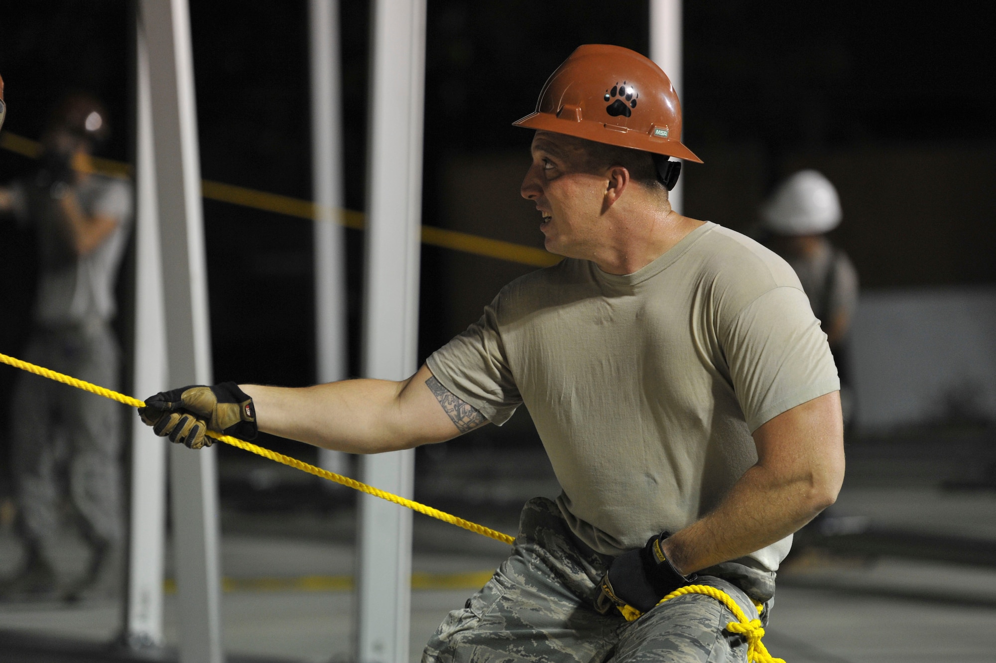 U.S. Air Force Tech. Sgt. Patrick Donahue, 49th Materiel Maintenance Squadron (MMS) structural specialist, from Holloman Air Force Base, N.M., pulls on a safety rope Aug. 7, 2016, at Incirlik Air Base, Turkey. The 49th MMS is the only active duty squadron in the Air Force that specializes in Basic Expeditionary Airfield Resources. (U.S. Air Force photo by Airman 1st Class Devin M. Rumbaugh)