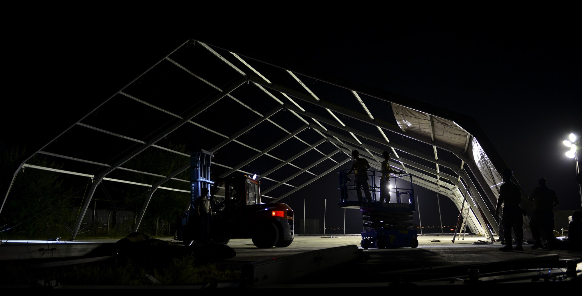 U.S. Air Force Airmen from the 49th Materiel Maintenance Squadron from Holloman Air Force Base, N.M., build an 8K dome shelter Aug. 8, 2016, at Incirlik Air Base, Turkey. The team from Holloman AFB specializes in Basic Expeditionary Airfield Resources and construction of large shelters. (U.S. Air Force photo by Tech. Sgt. Caleb Pierce)
