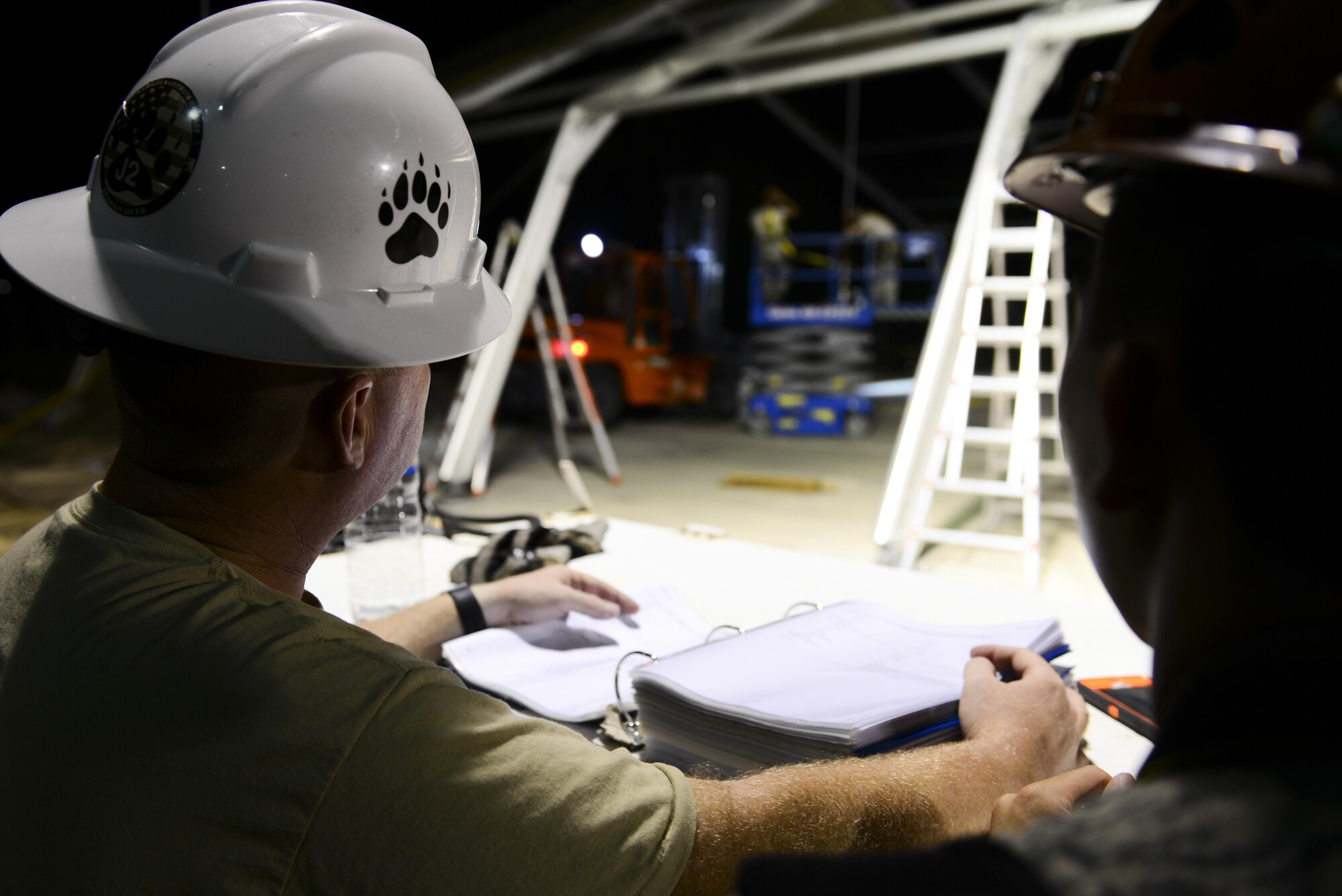 U.S. Air Force Master Sgt. Jason Tye, 49th Materiel Maintenance Squadron (MMS), support flight superintendent, supervises Airmen building an 8K dome shelter Aug. 8, 2016, at Incirlik Air Base, Turkey. The Airmen, who are deployed from the 49th MMS, Holloman Air Force Base, N.M., came to construct the specialized shelters used for maintenance. (U.S. Air Force photo by Tech. Sgt. Caleb Pierce)