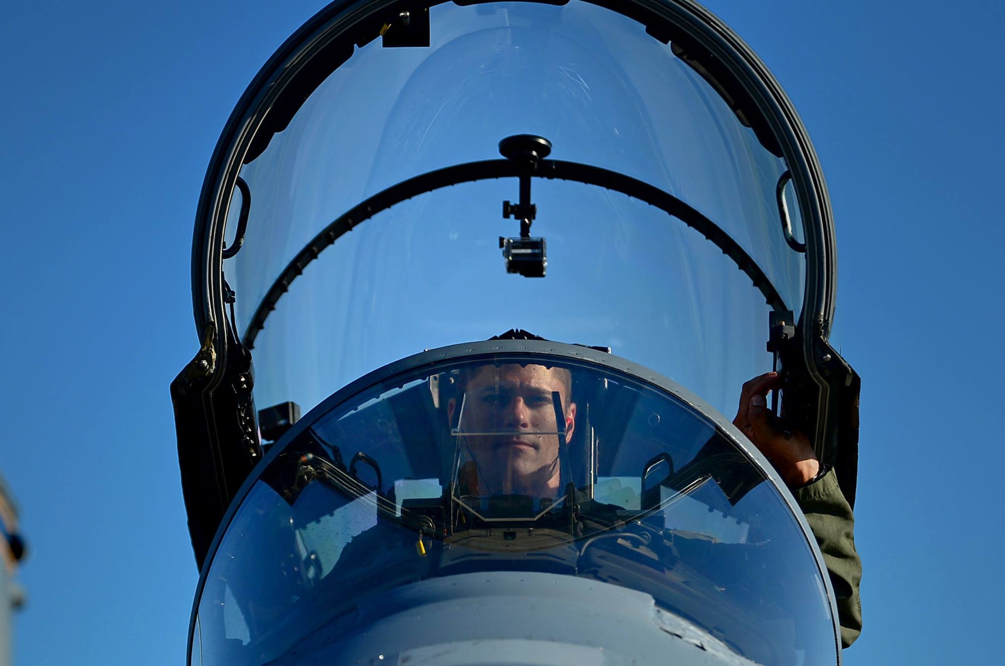 U.S. Air Force Maj. Benjamin Leestma, California Air National Guard 194th Expeditionary Fighter Squadron F-15C Eagle pilot, prepares to depart a 493rd Fighter Squadron F-15D Eagle after completing a training flight at Ämari Air Base, Estonia, Aug. 24, 2016. The 493rd FS, assigned to Royal Air Force Lakenheath, England, and, the 194th EFS assigned to the California ANG in Fresno, are participating in a flying training deployment with 16 F-15C Eagle aircraft alongside national allies in focus of maintaining security and building partnership capacity with Estonia. (U.S. Air Force photo by Senior Airman Erin Trower/Released)