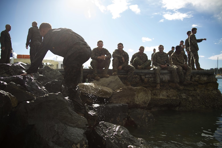 A Marine with Marine Rotational Force – Darwin climbs back to shore after completing a swimming test during a French Armed Forces Nautical Commando Course off the coast of Noumea, New Caledonia, August 15, 2016. The course is a part of Exercise AmeriCal 16, a bilateral training exercise designed to enhance mutual combat capabilities and improve relations with our partners by exchanging a U.S. Marine Corps and French Armed Forces infantry platoon. While the U.S. Marines are in New Caledonia, the French infantry platoon traveled to Australia to participate in Exercise Koolendong 16 with U.S. and Australian forces. 