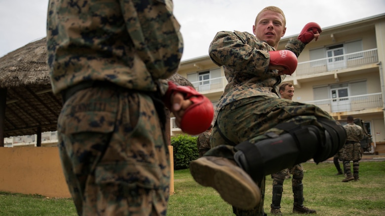 Cpl. Tate J. Sherman, a mortarman, practices kick boxing techniques during a French Armed Forces Nautical Commando Course at Quartier Gribeauval, New Caledonia, August 16, 2016. The course is a part of Exercise AmeriCal 16, a bilateral training exercise designed to enhance mutual combat capabilities and improve relations with our partners by exchanging a U.S. Marine Corps and French Armed Forces infantry platoon. While the U.S. Marines are in New Caledonia, the French infantry platoon traveled to Australia to participate in Exercise Koolendong 16 with U.S. and Australian forces. Sherman, from Plymouth, Minnesota, is with Marine Rotational Force – Darwin 