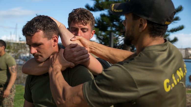 A French Army course instructor helps Marines with Marine Rotational Force – Darwin practices tactical close combat techniques during a French Armed Forces Nautical Commando Course at Quartier Gribeauval, New Caledonia, August 17, 2016. The course is a part of Exercise AmeriCal 16, a bilateral training exercise designed to enhance mutual combat capabilities and improve relations with our partners by exchanging a U.S. Marine Corps and French Armed Forces infantry platoon. While the U.S. Marines are in New Caledonia, the French infantry platoon traveled to Australia to participate in Exercise Koolendong 16 with U.S. and Australian forces. 