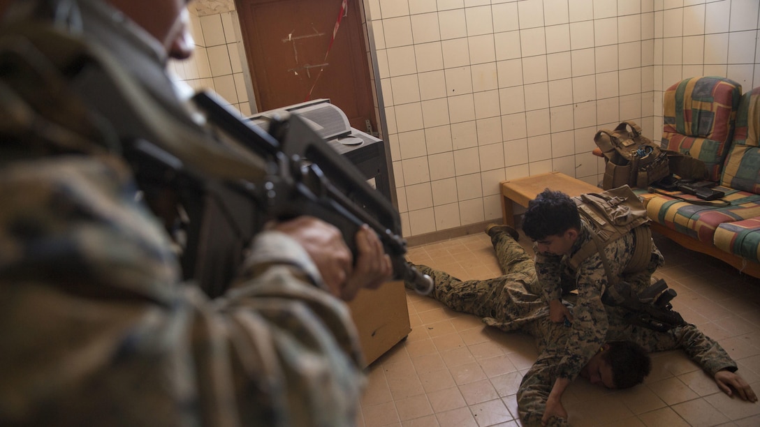 Marines with Marine Rotational Force – Darwin practice capturing enemy personnel during a French Armed Forces Nautical Commando Course at Quartier Gribeauval, New Caledonia, August 18, 2016. The course is a part of Exercise AmeriCal 16, a bilateral training exercise designed to enhance mutual combat capabilities and improve relations with our partners by exchanging a U.S. Marine Corps and French Armed Forces infantry platoon. While the U.S. Marines are in New Caledonia, the French infantry platoon traveled to Australia to participate in Exercise Koolendong 16 with U.S. and Australian forces. 