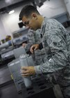 Airman 1st Class Jared Keith, 2nd Munitions Squadron Production Flight conventional maintenance crew member, inspects a flare stick before putting it into a module at Barksdale Air Force Base, La., August 18, 2016. Flares are used as a countermeasure to deter heat-seeking weapons that target an aircraft’s engines. (U.S. Air Force photo/Airman 1st Class Stuart Bright)