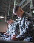 Staff Sgt. Matthew Wright, 2nd Munitions Squadron Production Flight conventional maintenance crew chief, and Airman 1st Class Sterling Crutcher, 2nd MUNS Production Flight  conventional maintenance crew member, prepare to build and test flare modules at Barksdale Air Force Base, La., August 18, 2016. The four-member team test the flares to make sure they are working properly before they are loaded on an aircraft. (U.S. Air Force photo/Airman 1st Class Stuart Bright)