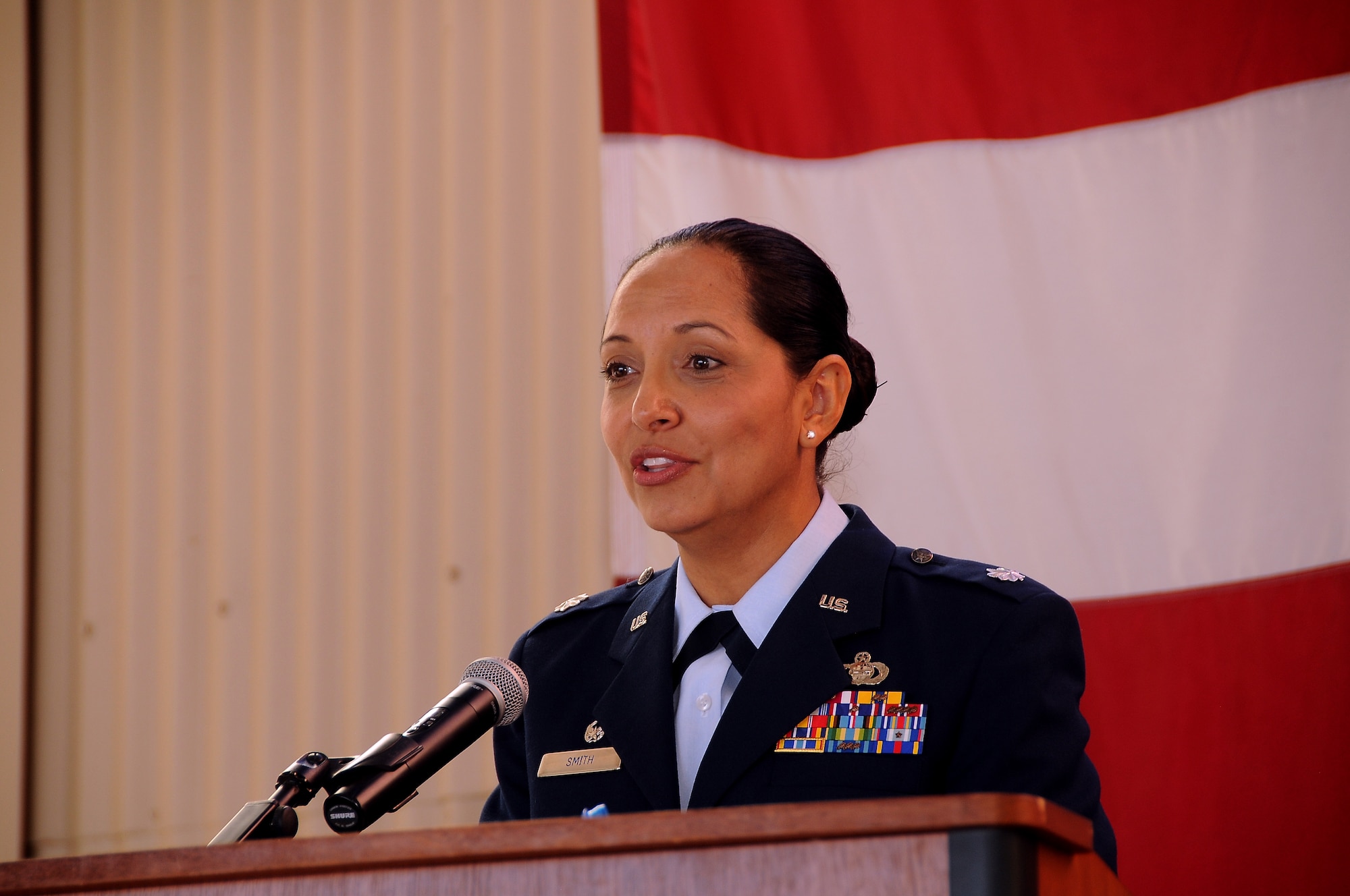 Lt. Col. Susana Smith, commander of the 250th Intelligence Squadron, addresses members of the 150th Special Operations Wing as well as other special guests, during the Aug. 19 ribbon cutting ceremony of their newly remodeled building. (U.S. National Guard photo by Master Sgt. Paula Aragon)