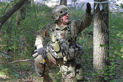 A U.S. Army Reserve Soldier assigned to the 327th Engineer Company, 397th Engineer Battalion, 372nd Engineer Brigade, 416th Theater Support Command, directs his squad during a complex attack during Combat Support Training Exercise 86-16-03 (CSTX 86-16-03) on Fort McCoy, Wis., Aug. 22, 2016. Nearly 9,000 service members from across the country are participating in CSTX 86-16-03 hosted by the 86th Training Division and the 84th Training Command’s third and final CSTX of the year. (U.S. Army Reserve Photo by Sgt. 1st Class Clinton Wood).