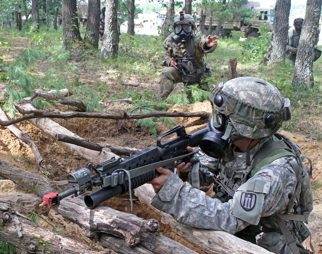 A U.S. Army Reserve Soldier assigned to the 327th Engineer Company, 397th Engineer Battalion, 372nd Engineer Brigade, 416th Theater Support Command, directs his squad to move up in a complex attack during Combat Support Training Exercise 86-16-03 (CSTX 86-16-03) on Fort McCoy, Wis., Aug. 22, 2016. Nearly 9,000 service members from across the country are participating in CSTX 86-16-03 hosted by the 86th Training Division and the 84th Training Command’s third and final CSTX of the year. (U.S. Army Reserve Photo by Sgt. 1st Class Clinton Wood).