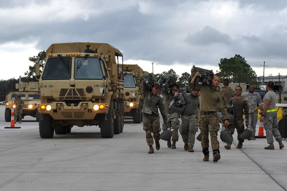 Soldiers assigned to the 3rd Brigade Combat Team, 82nd Airborne Division from Fort Bragg, N.C., arrive at an intermediate staging base Aug. 18, 2016, near Fort Polk, La. About 750 paratroopers jumped from Air Mobility Command aircraft in support of exercise Green Flag Little Rock 16-09. (U.S. Air Force photo/Airman Kevin Sommer Giron)