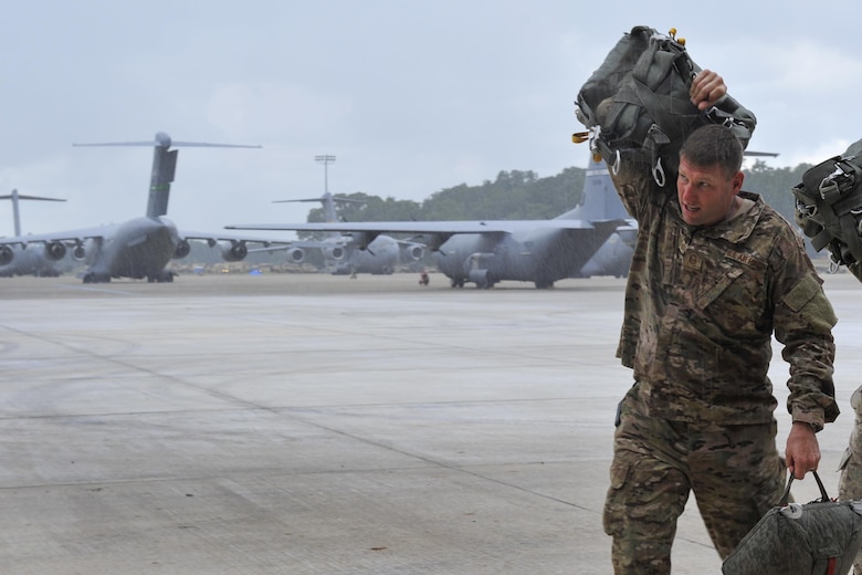A U.S. Air Force Airman from Little Rock Air Force Base, Ark., arrives at an intermediate staging base Aug. 18, 2016, near Fort Polk, La. Approximately 750 paratroopers jumped from Air Mobility Command aircraft in support of Exercise Green Flag Little Rock 16-09. (U.S. Air Force photo by Airman Kevin Sommer Giron)