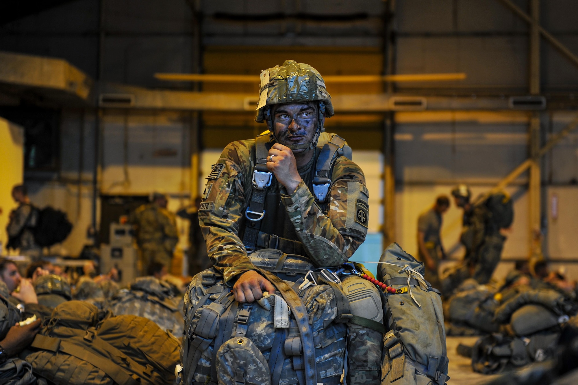 U.S. Army Spc. Brady Spillane, 82nd Airborne Division forward observer, prepares for a static-line jump in support of Exercise Green Flag Little Rock 16-09 Aug. 18, 2016, near Fort Polk, La. Spilllane is one of approximately 740 paratroopers to jump from Air Mobility Command aircraft during Green Flag. (U.S. Air Force photo by Airman Kevin Sommer Giron)
