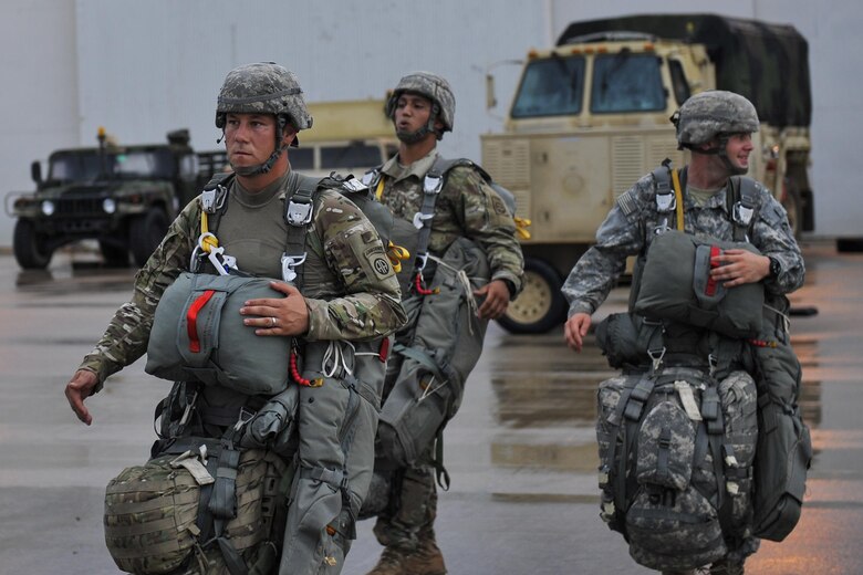 U.S. Army soldiers assigned to the 3rd Brigade Combat Team, 82nd Airborne Division from Fort Bragg, N.C., prepare to board a C130J for a static-line jump in support of Exercise Green Flag Little Rock 16-09 Aug. 18, 2016, near Fort Polk, La. 19th Airlift Wing aircraft dropped 24 sorties into the landing zone after a mass personnel drop of approximately 740 paratroopers. (U.S. Air Force photo/Amn Kevin Sommer Giron)