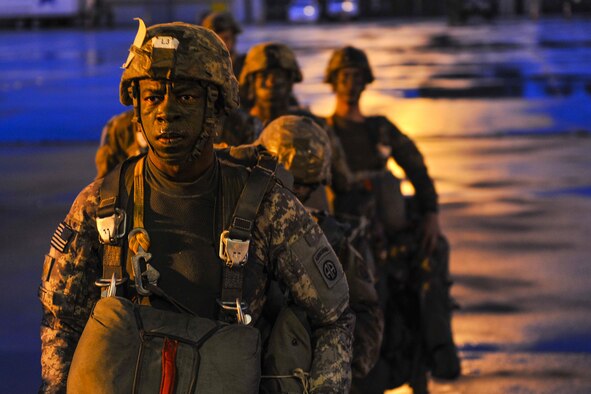 A U.S. Army soldier assigned to the 3rd Brigade Combat Team, 82nd Airborne Division from Fort Bragg, N.C., prepares to board a C-130J for a static-line jump in support of Exercise Green Flag Little Rock 16-09 Aug. 18, 2016, near Fort Polk, La. Once soldiers landed, their first objective was to create a blocking position to allow for land drops of cargo. (U.S. Air Force photo by Airman Kevin Sommer Giron)