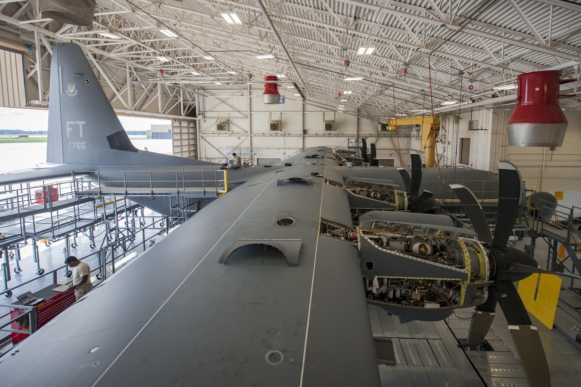 A dismantled HC-130J Combat King II undergoes a B-check isochronal inspection, Aug. 16, 2016, at Moody Air Force Base, Ga. B-check ISO inspections are performed after an HC-130J has been active for roughly 270 days. (U.S. Air Force photo by Airman 1st Class Daniel Snider/Released)
