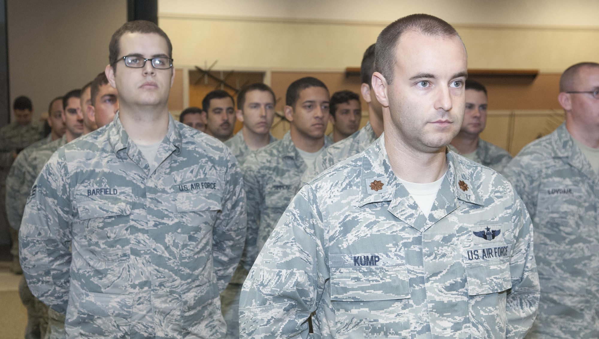 Members of the 682d Air Support Operations Squadron stand at ease prior to the start of a change-of-command ceremony here July 22. Lt. Col. Nicole Capozzi took command of the unit during the ceremony. (U.S. Air Force photo/Marc Barnes) 
