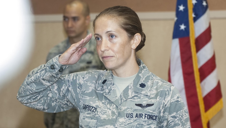 Lt. Col. Nicole Capozzi salutes the members of the 682d Air Support Operations Squadron after taking command of the unit here July 22. Capozzi comes to Pope Field from the 1st Air Support Operations Group at Joint Base Lewis-McChord, Washington, where she served as the director of operations. (U.S. Air Force photo/Marc Barnes) 