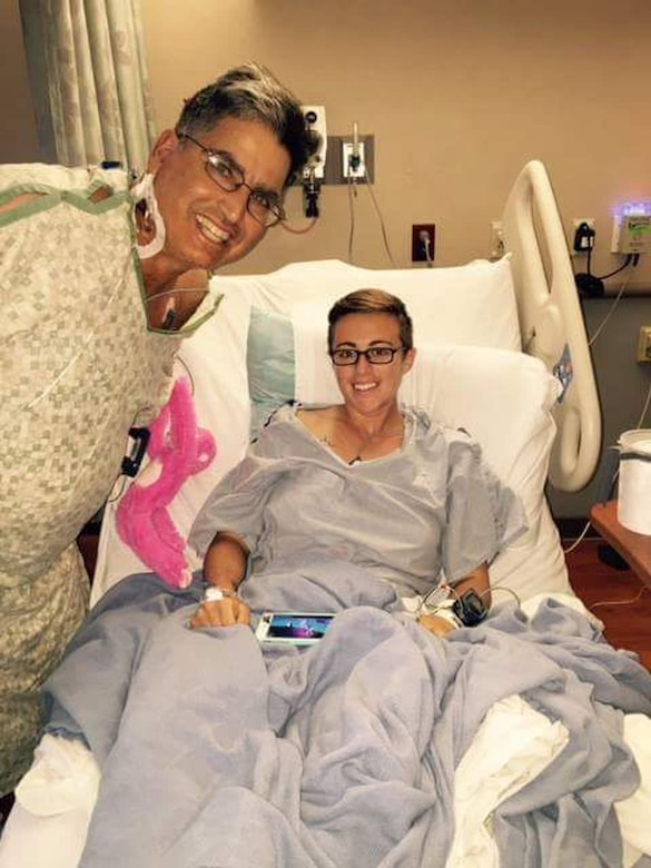 Texas Army National Guard Spc. Brittany Reppond, with the 197th Special Troops Support Company based out of Camp Bullis, right, takes a photo with Arthur Corenblith at the Methodist Specialty and Transplant Hospital in San Antonio, Feb. 18, 2016. Texas Army National Guard photo by Sgt. Elizabeth Pena